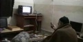 Osama bin Laden watching TV at his compound in Pakistan-3.jpg